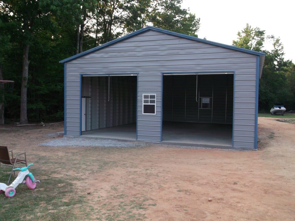 Photo of A Frame garage with two roll up doors, one walkin door, two windows Item # 73