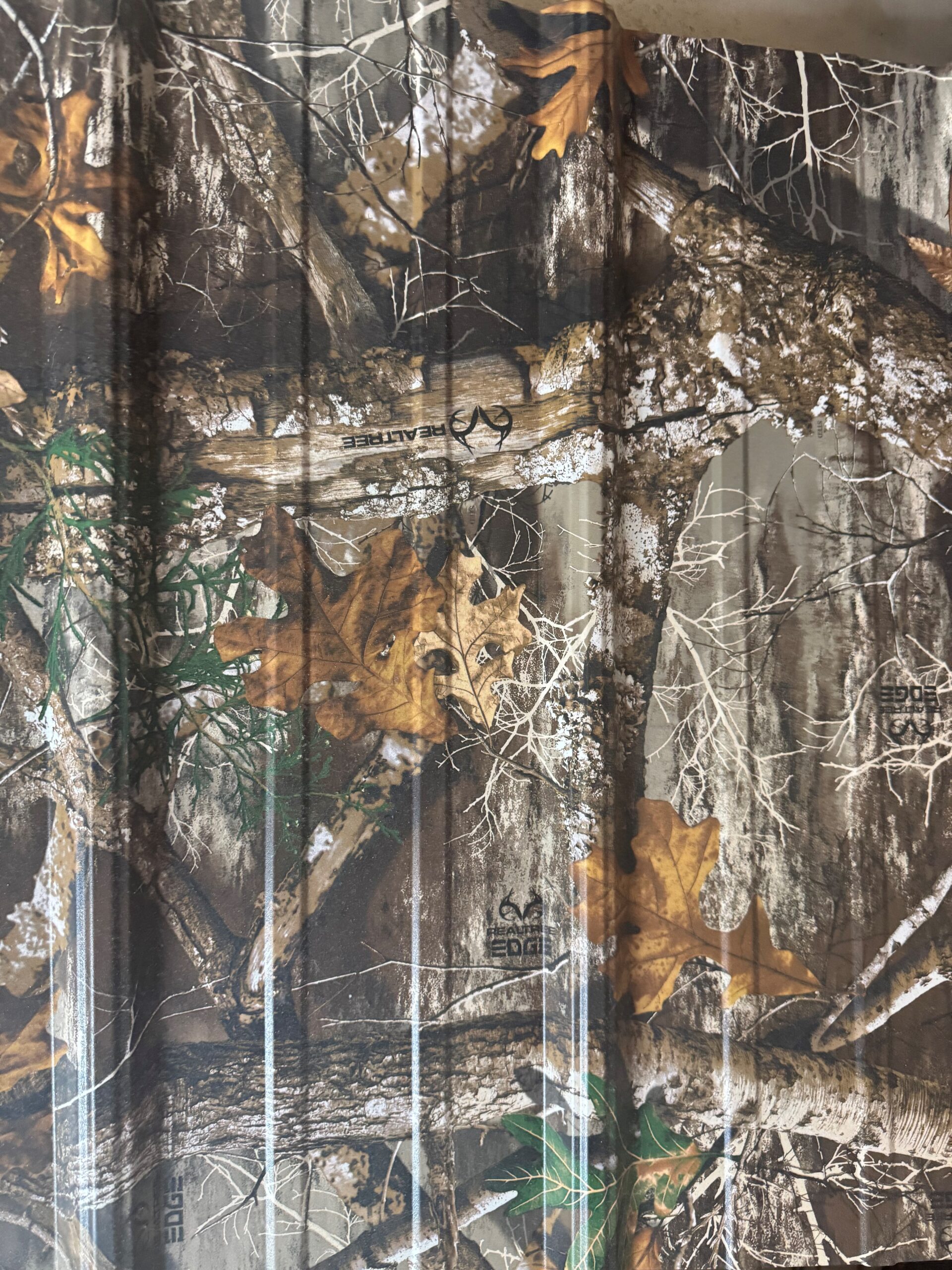 A camo pattern on metal sheeting